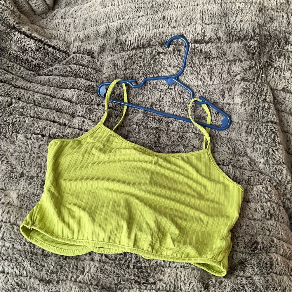 I am selling a solid tie back open shirt